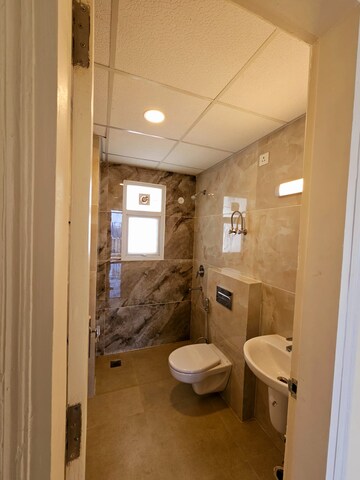 Bathroom in 3 BHK Apartment at Omaxe The Palace, Gomti Nagar – for Rent