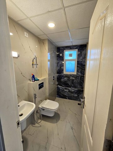 Bathroom in 3 BHK Apartment at Omaxe The Palace, Gomti Nagar – for Rent