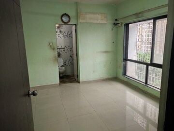 Room in 2 BHK Apartment at Clover Everest World Chs Ltd, Kolshet Road – for Rent
