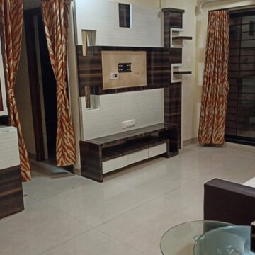 Living Room in 1 BHK Apartment at Raheja Interface Heights, Mindspace – for Rent
