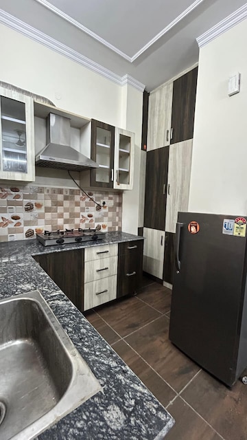 Kitchen in 2 BHK Apartment at Shree Vardhman Green Court, Sector 90 – for Rent