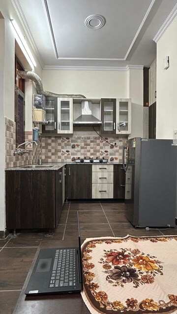 Kitchen in 2 BHK Apartment at Shree Vardhman Green Court, Sector 90 – for Rent