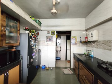 Kitchen in 1 BHK Apartment at Lokpuram CHS, Vasant Vihar – for Sale