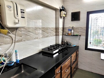 Kitchen in 1 BHK Apartment at Lokpuram CHS, Vasant Vihar – for Sale