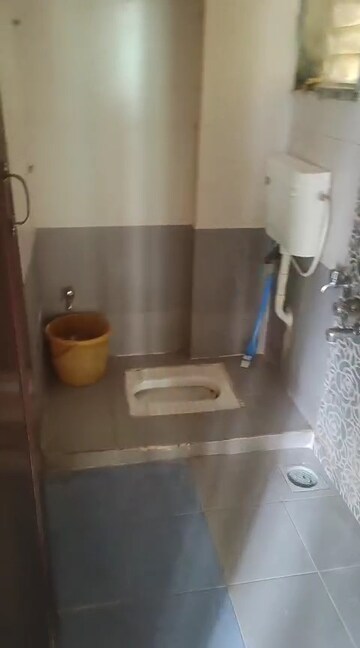 Bathroom in 1 BHK Apartment at Purushottam Park, Ghodbunder Road – for Rent