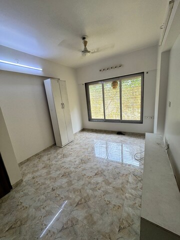 Living Room in 1 BHK Apartment at Laxmi Heights Goregaon, Goregaon West – for Rent