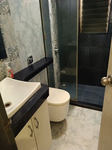 Bathroom in 2 BHK Apartment at Dosti Flamingos, Parel – for Rent