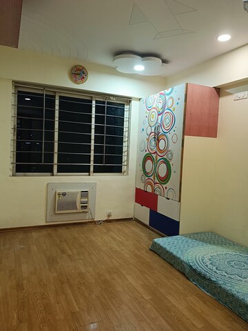 Bedroom in 2 BHK Apartment at Dosti Flamingos, Parel – for Rent
