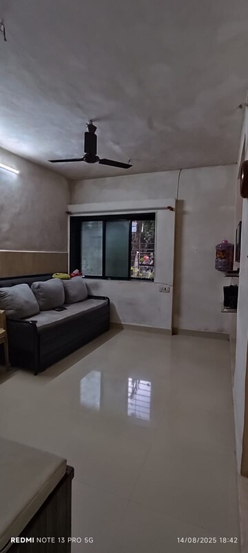 Living Room in 1 BHK Apartment at Paras CHS Borivali, Borivali West – for Sale
