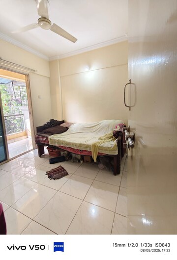 Living Room in 1 BHK Apartment at Vishwakarma Tower, Kharghar – for Rent