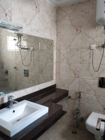 Bathroom in 4 BHK Apartment at Safdarjung Enclave – for Rent