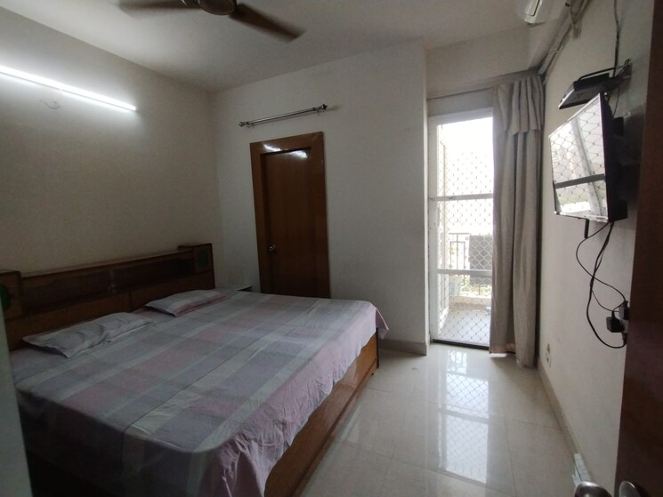 Bedroom, signature-global-the-roselia 2 Bedroom 800 Sq.Ft. Apartment In Sector 95a Gurgaon 9070440