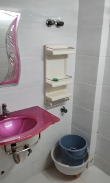Bathroom in 1 BHK Apartment at Neptune CHS Andheri West, Andheri West – for Rent