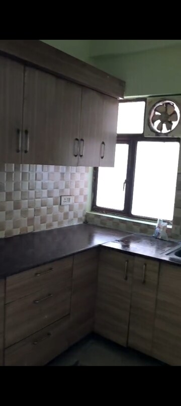 Kitchen in 2 BHK Apartment at Gaur City 6th Avenue, Sector 4 Greater Noida – for Rent