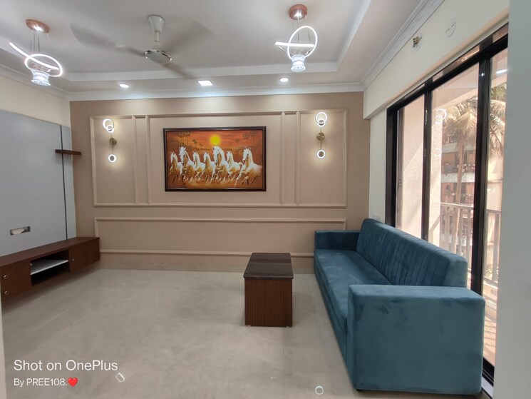 Living Room, jp-anant 2 Bedroom 835 Sq.Ft. Apartment In Chikan Ghar Thane 9070597