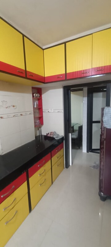 Kitchen in 1 BHK Apartment at Shubh-Man Mandir Apartment, Andheri West – for Sale