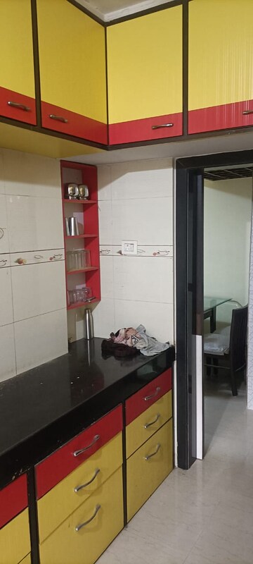 Kitchen in 1 BHK Apartment at Shubh-Man Mandir Apartment, Andheri West – for Sale