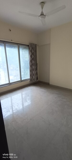 Room in 2 BHK Apartment at Pushkraj Apartments, Goregaon East – for Sale