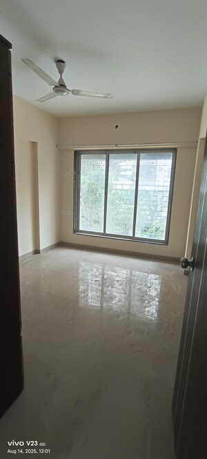 Room in 2 BHK Apartment at Pushkraj Apartments, Goregaon East – for Sale