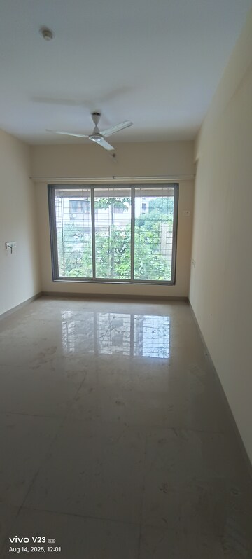 Room in 2 BHK Apartment at Pushkraj Apartments, Goregaon East – for Sale