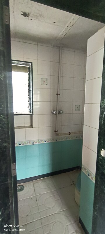 Bathroom in 1 BHK Apartment at Vasundhara CHS Gokuldham, Gokuldham Colony – for Rent