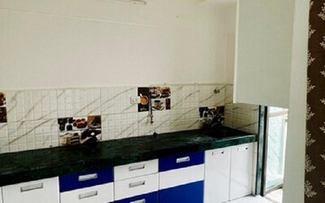 Kitchen in 1 BHK Apartment at Man Opus, Mira Road – for Sale