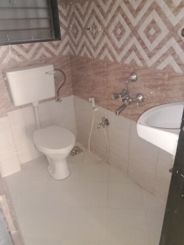 Bathroom in 2 BHK Apartment at Ritu Gardenia, Naigaon East – for Rent