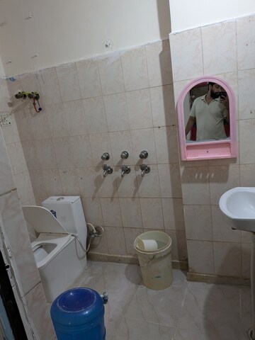 Bathroom in 2.5 BHK Builder Floor at Nirman Vihar – for Rent