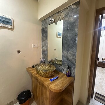 Bathroom in 2 BHK Apartment at Om Heights Malad East, Matanpur Nagar – for Rent