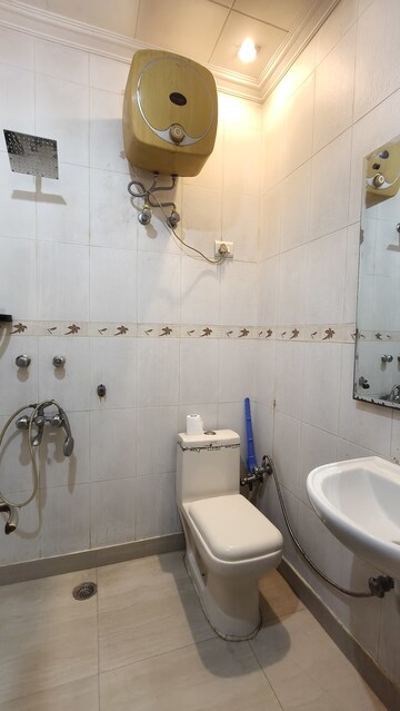 Bathroom in 2 BHK Builder Floor at Pamposh Enclave – for Rent