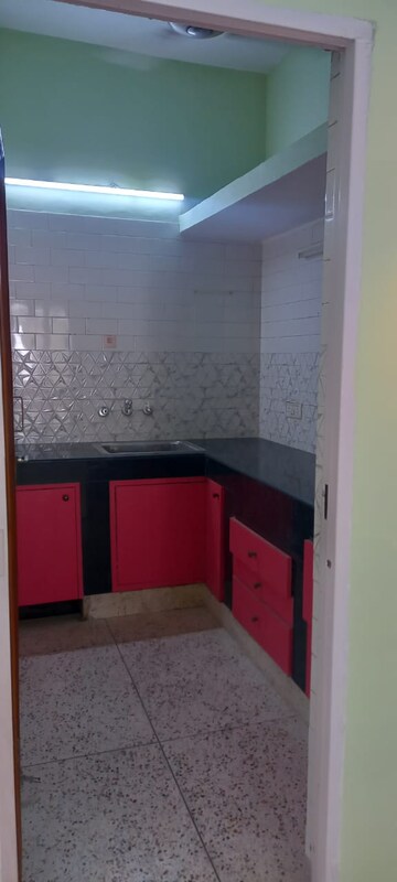 Kitchen in 1.5 BHK Builder Floor at Pamposh Enclave – for Rent