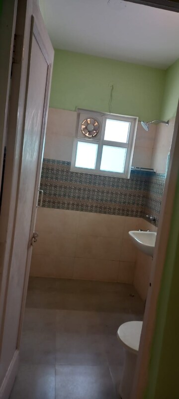 Bathroom in 1.5 BHK Builder Floor at Pamposh Enclave – for Rent