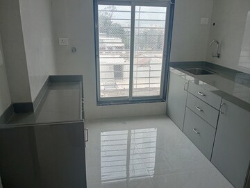 Kitchen in 1 BHK Apartment at Bindra Complex, Andheri East – for Rent