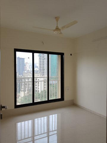 Room in 1 BHK Apartment at Oxford Navrang Crystal, Goregaon West – for Rent