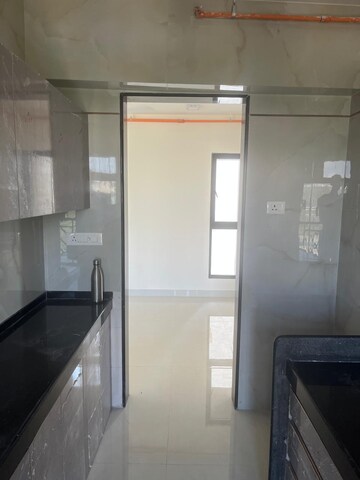 Kitchen in 2 BHK Apartment at Sheth Irene, Malad West – for Rent