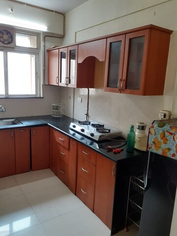 Kitchen in 1 BHK Apartment at Hiranandani Cardinal, Ghodbunder Road – for Rent