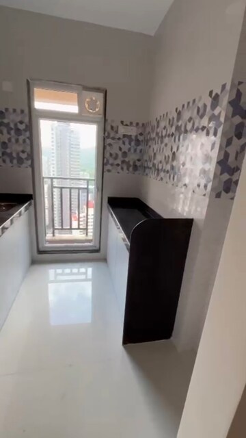 Kitchen in 1 BHK Apartment at Raunak Bliss, Ghodbunder Road – for Rent