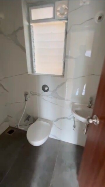 Bathroom in 1 BHK Apartment at Raunak Bliss, Ghodbunder Road – for Rent