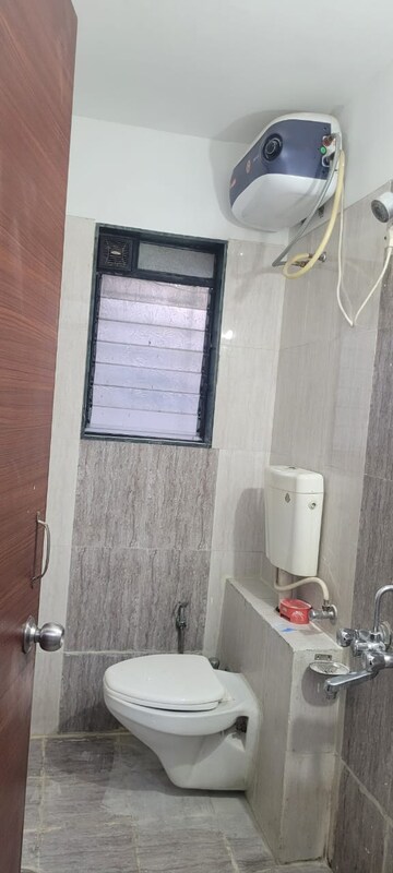 Bathroom in 2 BHK Apartment at Altiuus Drome Apartment, Wadgaon Sheri – for Rent