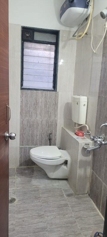 Bathroom in 2 BHK Apartment at Altiuus Drome Apartment, Wadgaon Sheri – for Rent