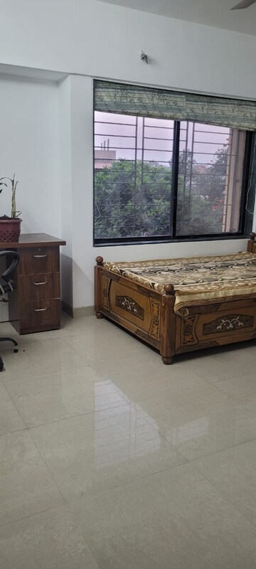 Living Room in 2 BHK Apartment at Altiuus Drome Apartment, Wadgaon Sheri – for Rent