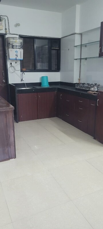 Kitchen in 2 BHK Apartment at Altiuus Drome Apartment, Wadgaon Sheri – for Rent
