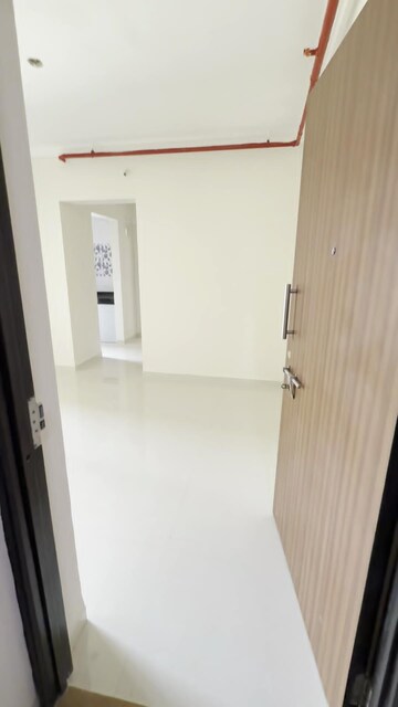 Living Room in 1 BHK Apartment at Raunak Bliss, Ghodbunder Road – for Rent