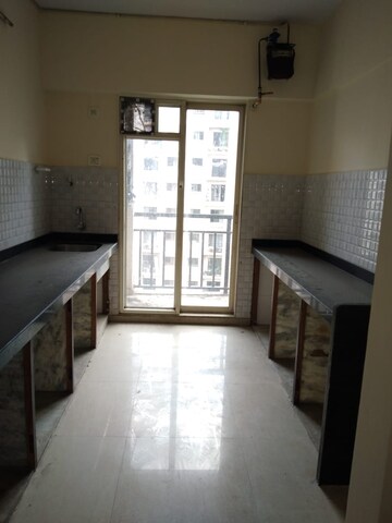Kitchen in 2 BHK Apartment at Rosa Gardenia, Ghodbunder Road – for Rent