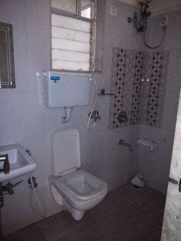 Bathroom in 2 BHK Apartment at Rosa Gardenia, Ghodbunder Road – for Rent