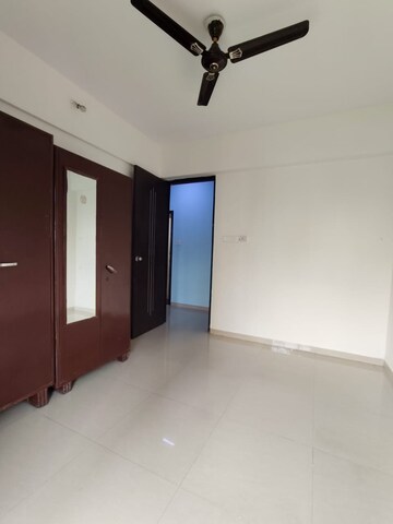 Bedroom in 2 BHK Apartment at Nisarg Hyde Park, Kharghar – for Rent