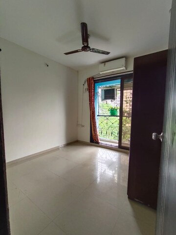 Bedroom in 2 BHK Apartment at Nisarg Hyde Park, Kharghar – for Rent