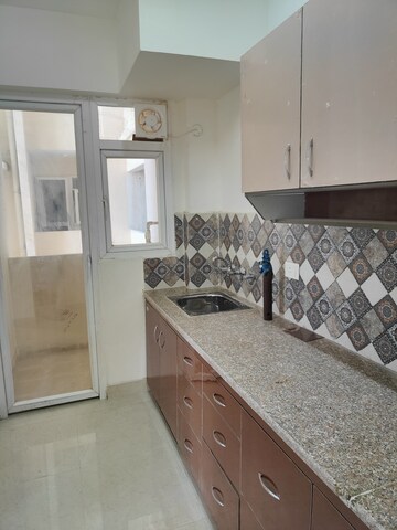Kitchen in 2 BHK Apartment at Signature Global Proxima, Sector 89 – for Rent