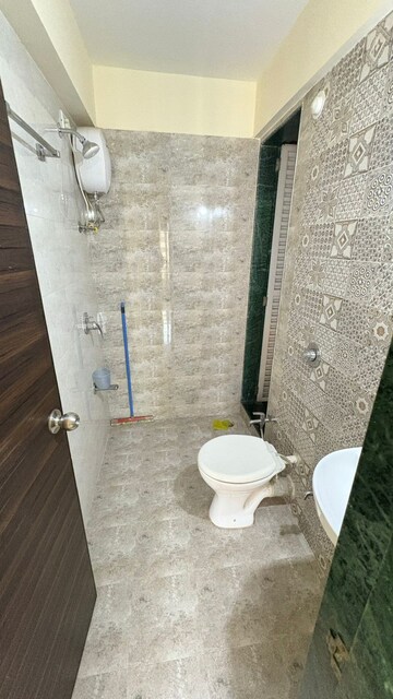Bathroom in 1 BHK Apartment at Velocity Hill Spring, Ghodbunder Road – for Rent