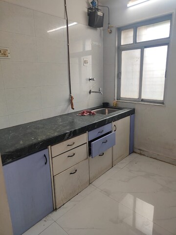 Kitchen in 1 BHK Apartment at Kanchan Pushp Society, Ghodbunder Road – for Rent